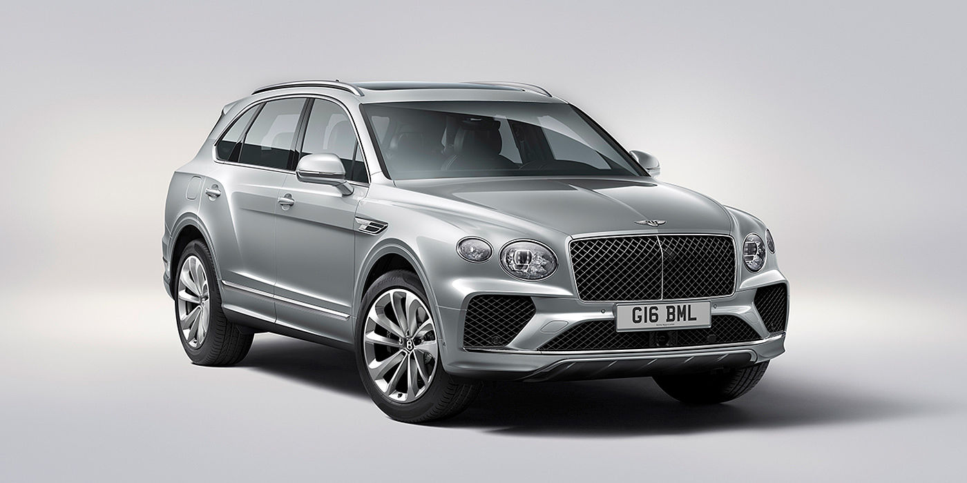 Bentley Adelaide Bentley Bentayga in Moonbeam paint, front three-quarter view, featuring a matrix grille and elliptical LED headlights.