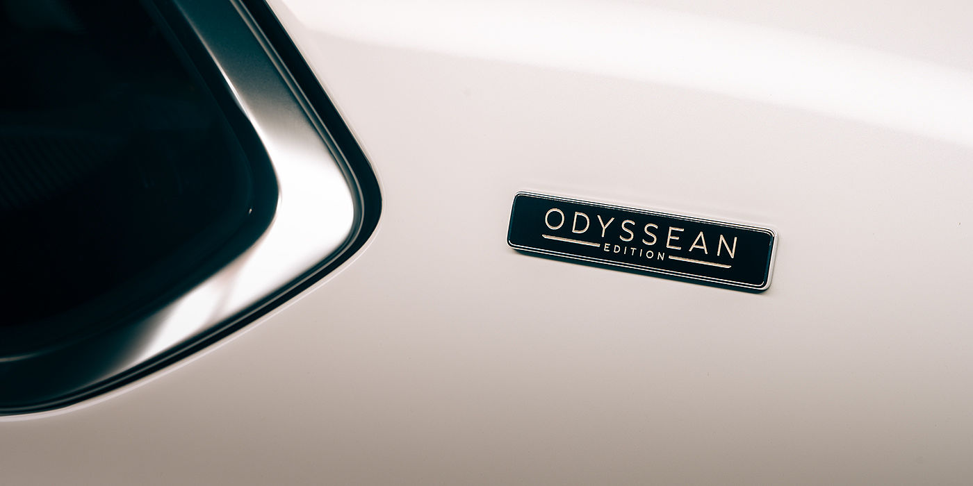 Bentley Adelaide Bentley Bentayga Odyssean Edition SUV Odyssean badge close up with Snow Quartz Pearlescent by Mulliner paint