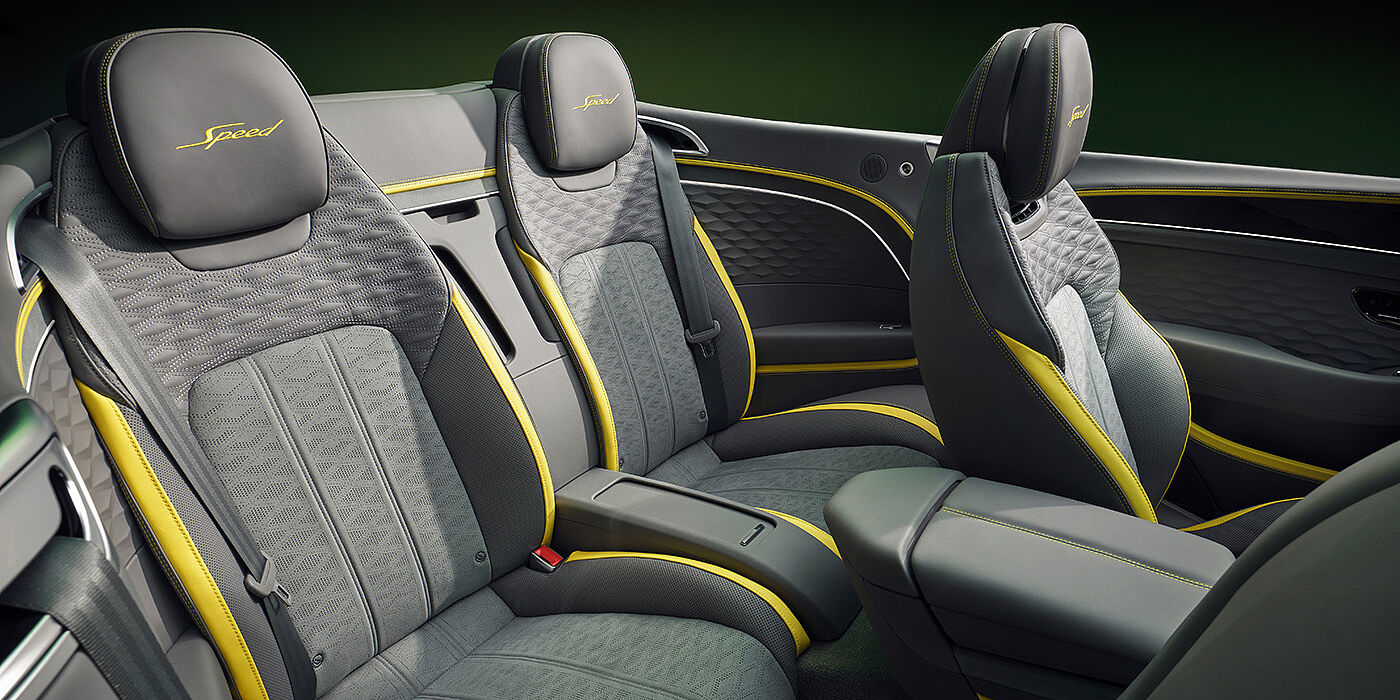 Bentley Adelaide Bentley New Continental GTC Speed convertible rear interior with unique Speed colour split in Gravity Grey and Cyber Yellow hide colours, and contrast stitched headrest emblems 