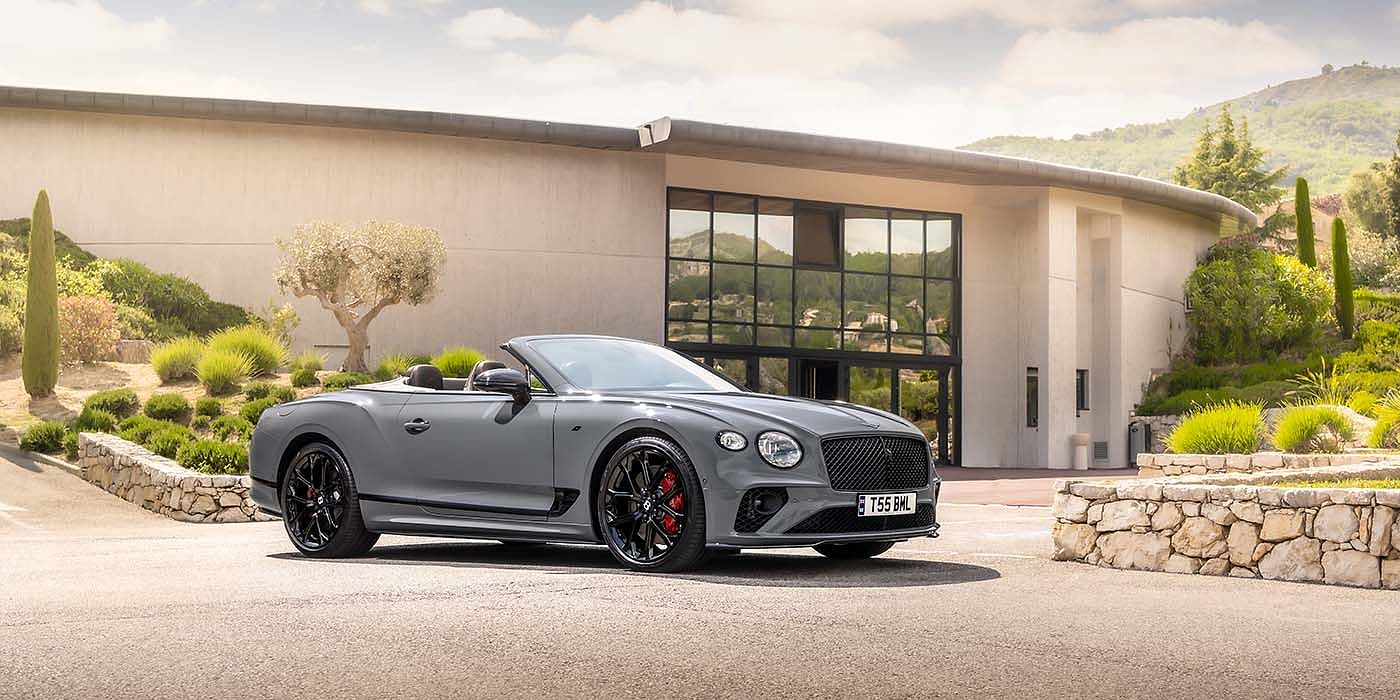 Bentley Adelaide Bentley Continental GTC S convertible in Cambrian Grey paint front 34 static near house