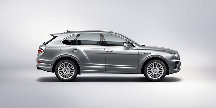 Bentley Adelaide Bentley Bentayga SUV side profile in Moonbeam silver paint against white background featuring 21 inch 5 spoke wheels